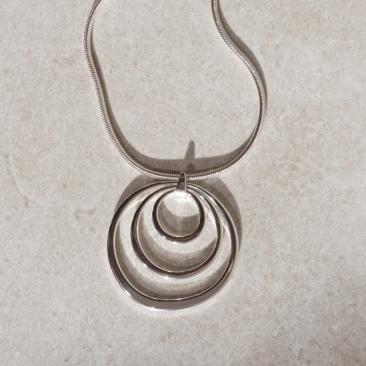 SILVER CIRCLES STATEMENT NECKLACE