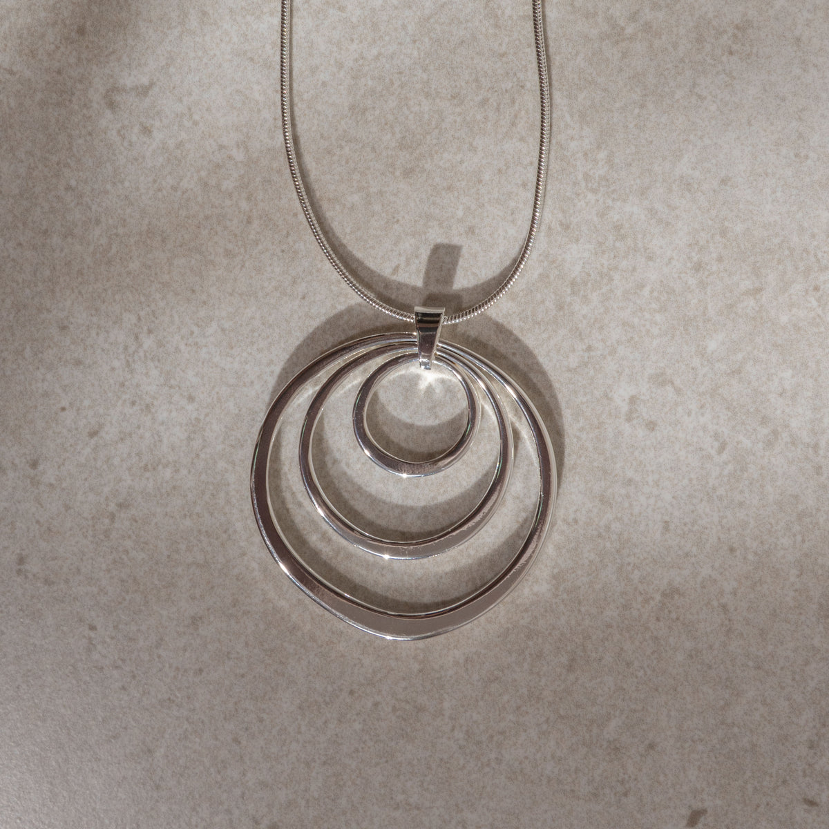 SILVER CIRCLES STATEMENT NECKLACE